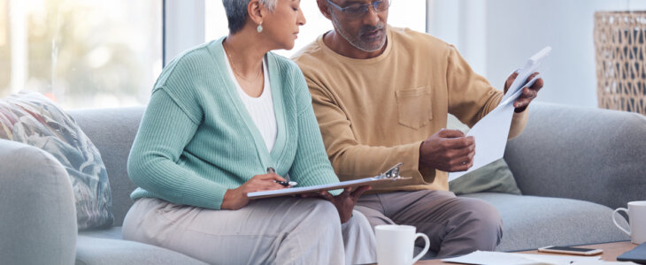 Senior couple looking at documents together