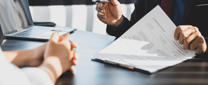 Trust attorney speaking with a client.